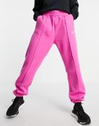 Nike Trend Fleece Oversized Cuffed Sweatpants In Pink