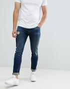 Asos Design 12.5oz Skinny Jeans With Rips And Abrasions In Dark Wash Blue