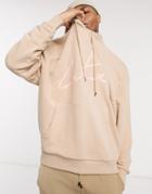 The Couture Club Oversized Applique Signature Hoodie Front And Hood Logo In Beige-neutral