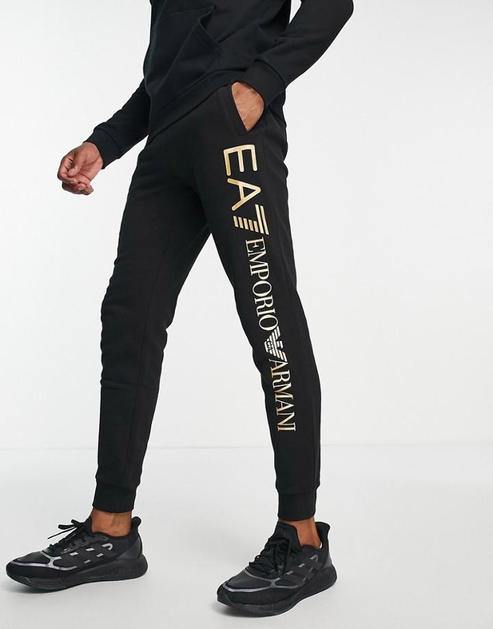 Armani Ea7 Large Gold Side Logo Joggers In Black