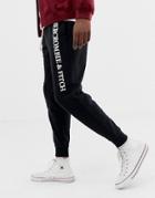 Abercrombie & Fitch Logo Cuffed Sweatpants In Black