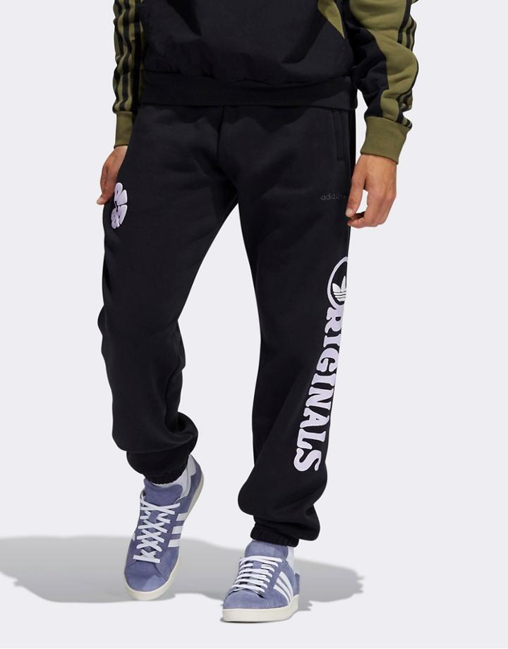 Adidas Originals Scattered Graphics Sweatpants In Black