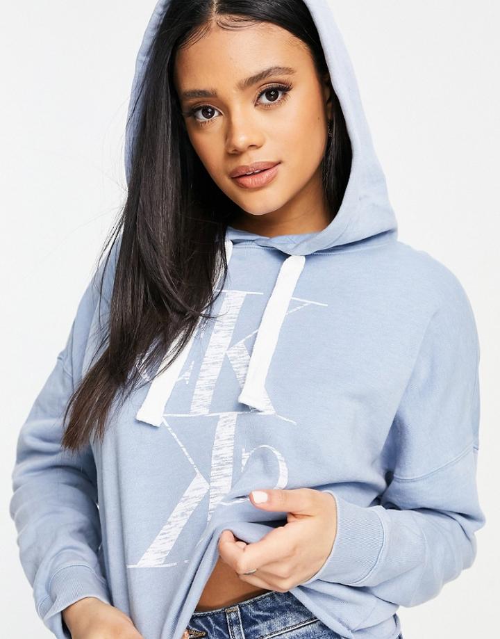 Calvin Klein Ck Logo Distressed Raw Hem Hoodie In Chambray Blue-blues