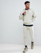Asos Design Tracksuit Oversized Hoodie/skinny Joggers With Contrast Cuff In Beige And Navy - Beige
