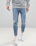 Pull & Bear Carrot Fit Jeans With Rips In Light Wash - Blue