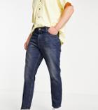 Reclaimed Vintage Inspired Slim Tapered Jeans In Dark Blue Wash-blues