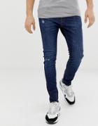 Bershka Join Life Super Skinny Jeans With Knee Rip And Abrasions In Dark Blue - Blue