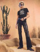 Asos Design Flare Pants With Faux Leather Laid On Panels In Washed Black