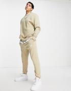 Nike Club Fleece Cuffed Sweatpants In Stone-neutral