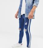 Mauvais Muscle Fit Jeans With Distressing And Side Stripe - Blue