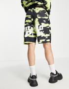 Asos Unrvlld Spply Longline Jersey Shorts With Logo In All-over Print In Green - Part Of A Set