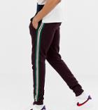Asos Design Tall Skinny Joggers With Side Stripe Taping In Burgundy - Red