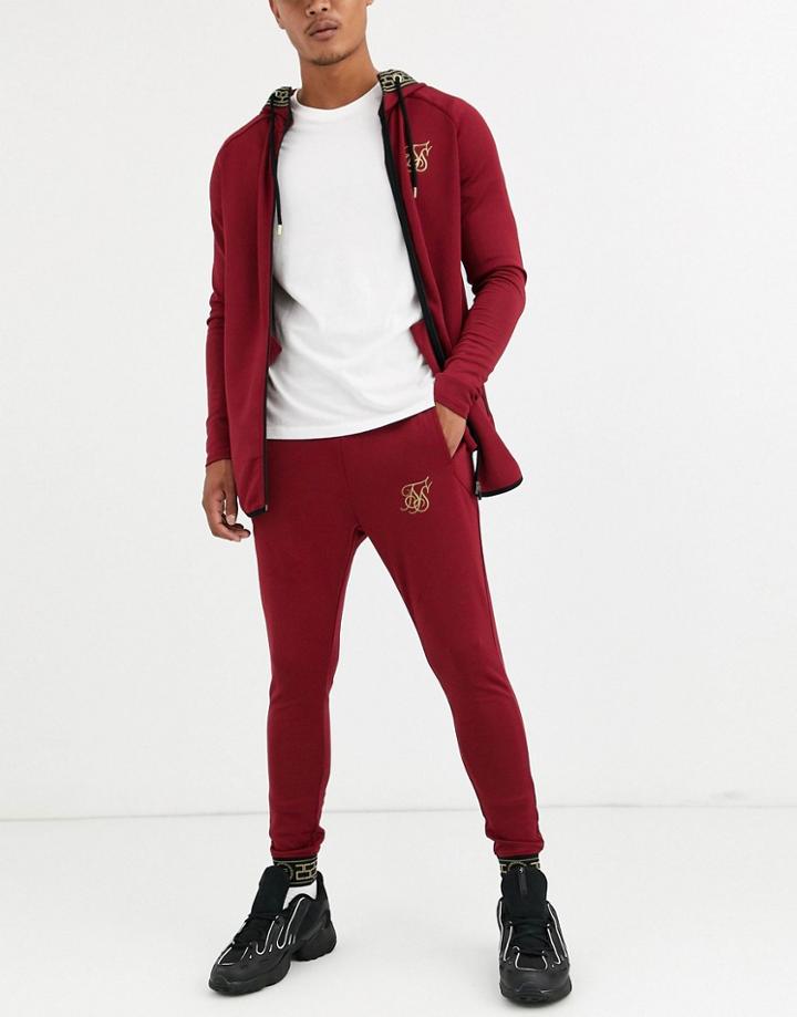 Siksilk Super Skinny Sweatpants In Burgundy With Baroque Cuff