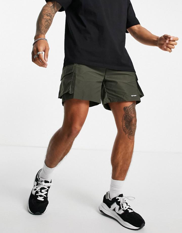 Night Addict Cargo Shorts In Khaki-green