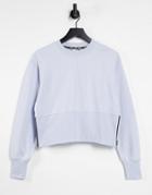 Dkny Cropped Crew Neck Sweatshirt With Side Zipper In Lake-purple