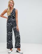 Yumi Jumpsuit In Animal Print - Black