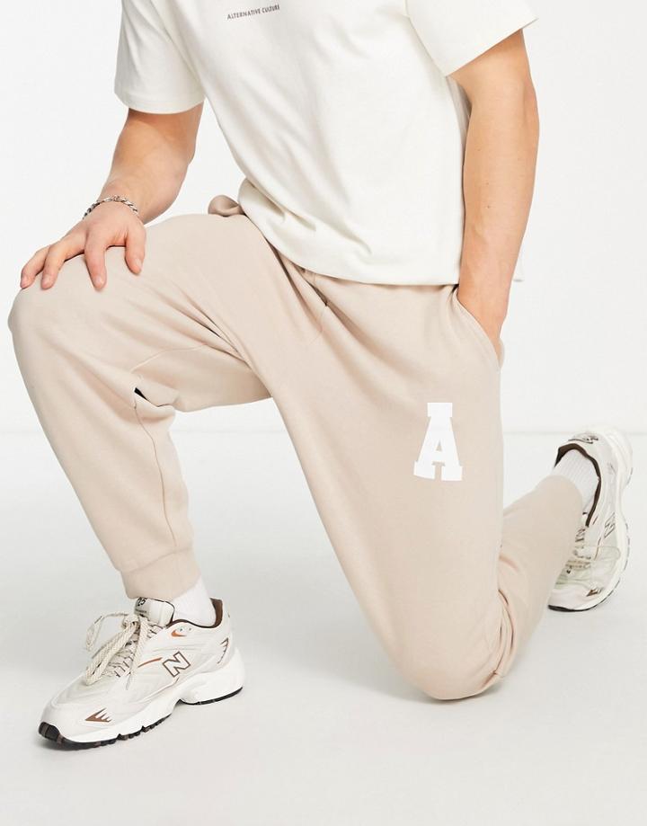 Asos Actual Athleisure Relaxed Sweatpants With Logo Print In Sand - Part Of A Set-neutral