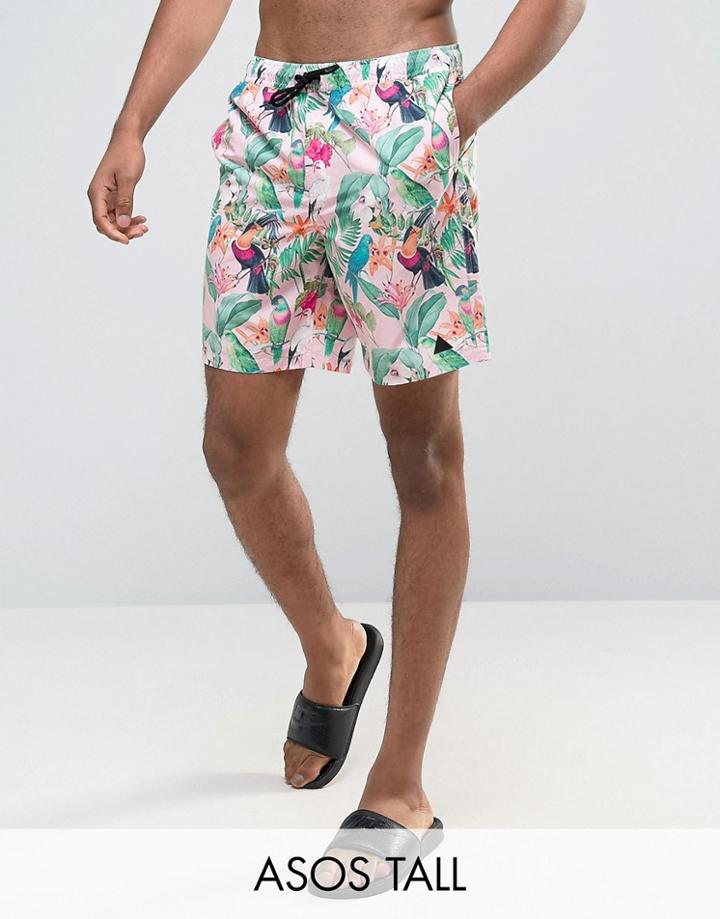 Asos Tall Swim Shorts In Pink Tropical Floral Print With Triangle Logo In Mid Length - Pink
