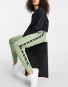 Nike Tape Pack Regular Fit Cuffed Fleece Sweatpants In Green