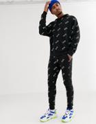 Asos Design Two-piece Skinny Sweatpants With All Over Print In Black