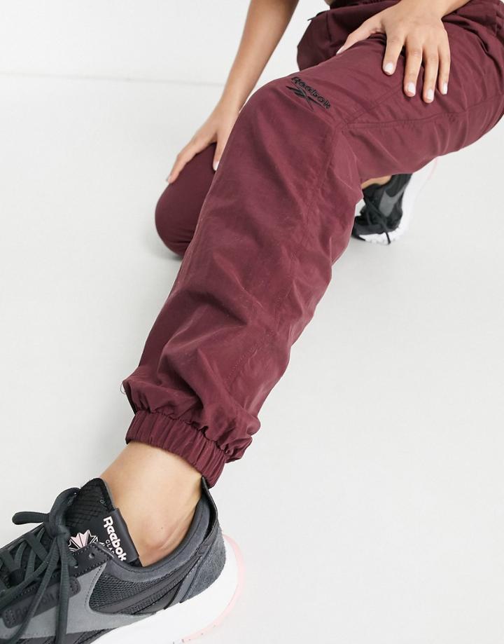 Reebok Logo Cuffed Sweatpants In Burgundy-red