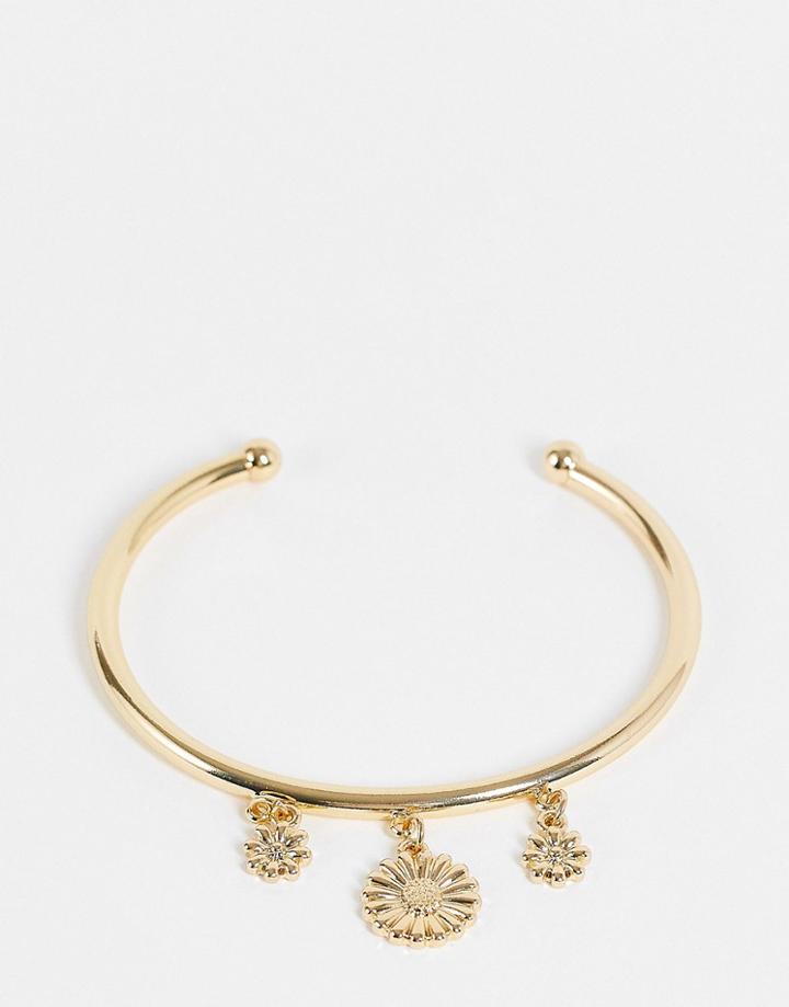 Asos Design Bangle Bracelet With Daisy Charms In Gold Tone