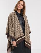 River Island Cape In Brown Monnogram