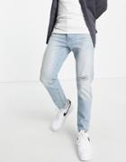 Asos Design Tapered Jeans In Vintage Light Wash With Rip-blues