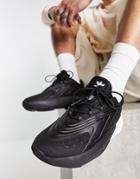 Adidas Originals Ozelia Sneakers In Black With Contrast Heel