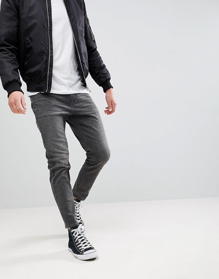 Asos Design Tapered Jeans In Vintage Washed Black