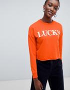 New Look Lucky Slogan Crop Sweat - Orange