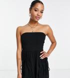 Asos Design Petite Crinkle Rayon Strapless Slouch Romper In Black