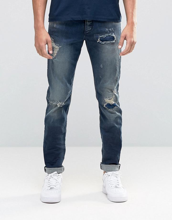 Jack & Jones Slim Fit Jeans In Mid Blue Wash With Rip Repair Detail - Black