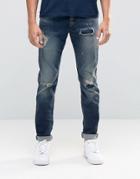 Jack & Jones Slim Fit Jeans In Mid Blue Wash With Rip Repair Detail - Black