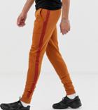 Asos Design Tall Super Skinny Sweatpants With Side Stripe In Dark Orange - Orange