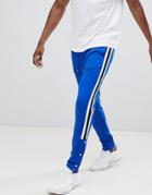 Asos Design Skinny Retro Track Joggers In Blue With Side Stripe And Popper Hem - Blue