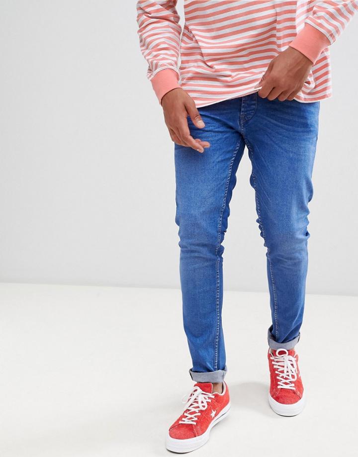 Solid Stretch Slim Jeans In Mid Wash Blue - Blue