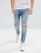 Pull & Bear Ripped Jeans In Carrot Fit In Mid Wash Blue - Blue