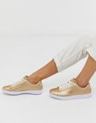 Lacoste Lace Up Sneaker In Gold
