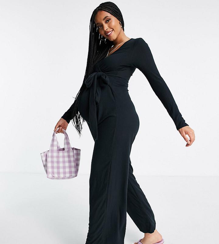 In The Style X Dani Dyer Ribbed Button Through Jumpsuit With Belt In Black