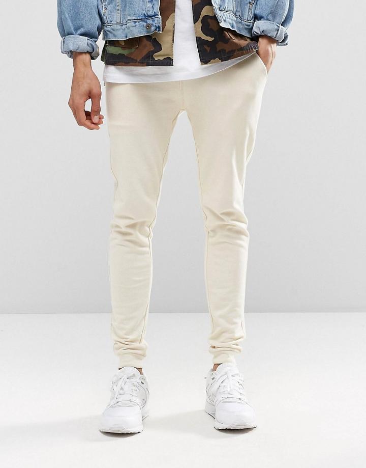 Asos Super Skinny Joggers In Off White - White Swan