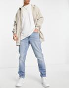 Asos Design Cotton Blend Stretch Slim Jeans In Vintage Light Wash Blue - Lblue-blues