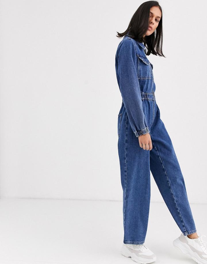 Asos Design Denim Zip Through Jumpsuit In Midwash Blue