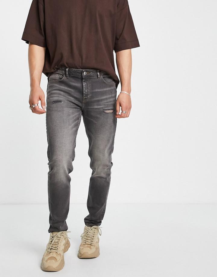 Asos Design Cotton Blend Skinny Jeans In Washed Black With Abrasions - Black