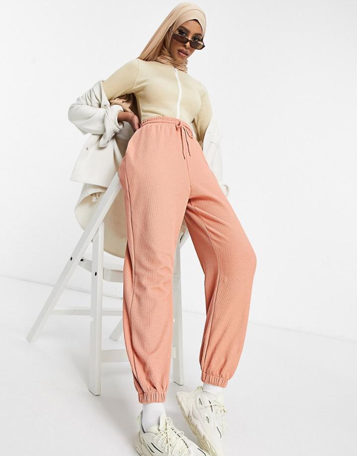 Asos Design Waffle Textured Sweatpants In Terracotta-orange