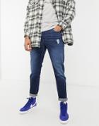 Asos Design Tapered Jeans With 'less Thirsty' Wash In Dark Blue With Abrasions-blues