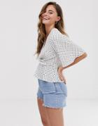 New Look Flutter Sleeve Wrap Blouse In White Polka Dot - White