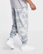Asos Unrvlld Spply Relaxed Sweatpants With All Over Wash & Logo Print In Blue - Part Of A Set-blues