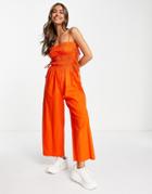 Asos Design Shirred Strappy Jumpsuit With Tie Side Detail In Red