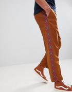 Asos Design Tapered Smart Trousers In Tan With Aztec Embroidered Side Stripe - Tan
